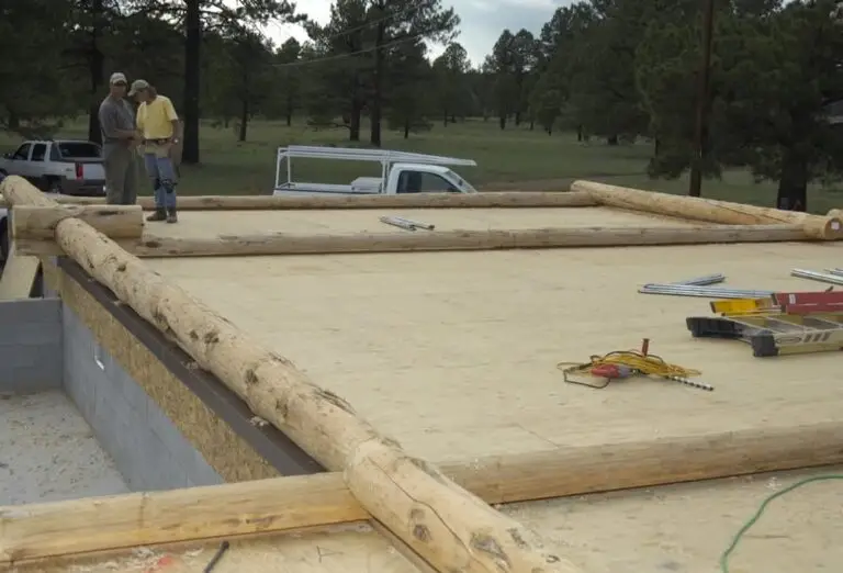 Custom log home under construction by Frontier Log Homes general contractor — photo 2