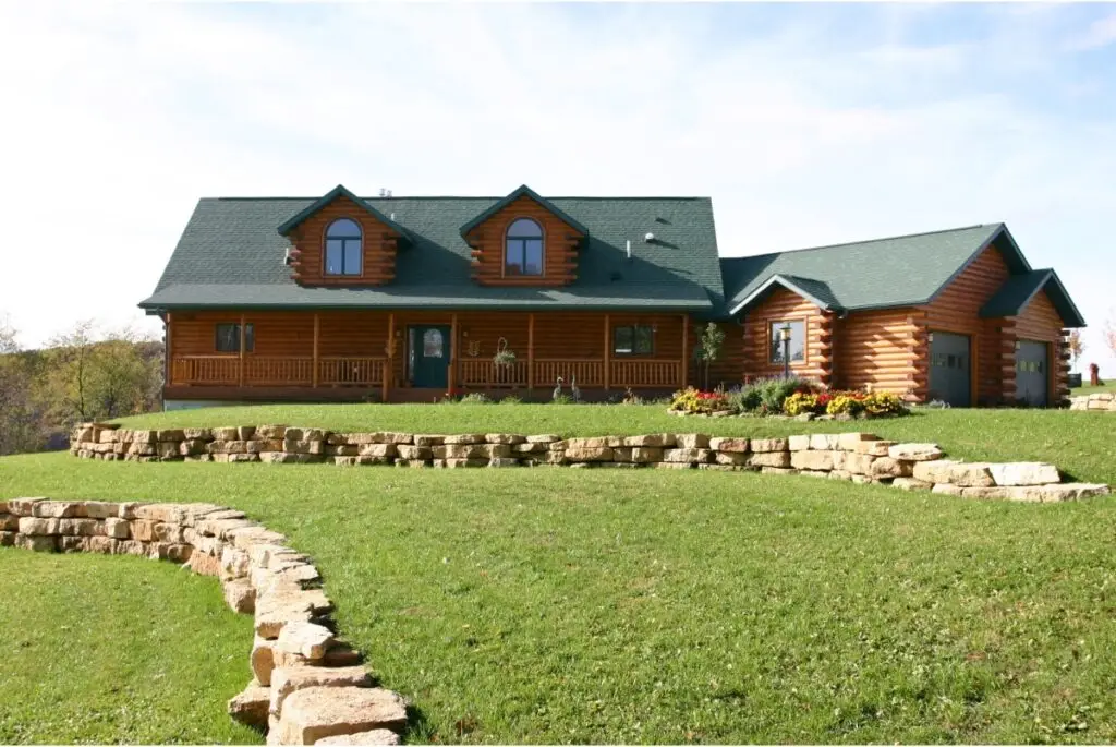 Different log home styles shown on a handcrafted cabin exterior