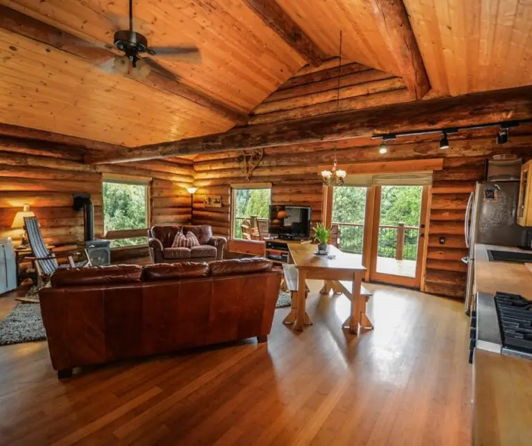 Family living in a log home with a warm timber interior