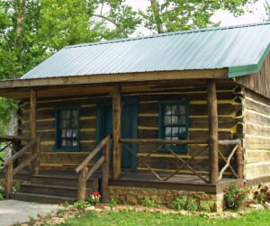 A finished log home where log home settling was planned for during construction